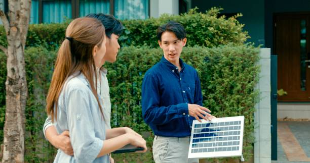 Neighbors Discussing Community Solar Energy At The Event