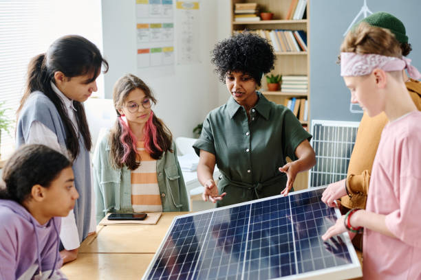 Volunteer Guiding Families Through Hands-On Solar Demonstrations